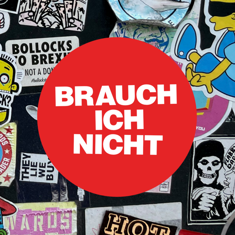 Roter kreisrunderAufkleber mit worauf „brauch ich nicht" steht.